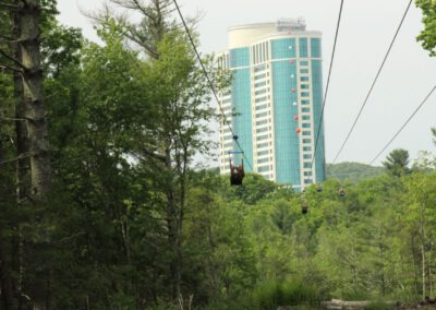 HighFlyer Zipline rider looking up at Fox Tower launch point, Foxwoods Resort Casino, Connecticut