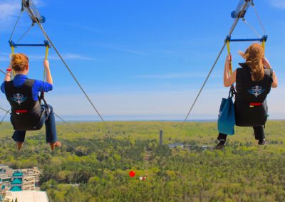 Group of women taking off on HighFlyer Zipline at Foxwoods Resort Casino, Connecticut