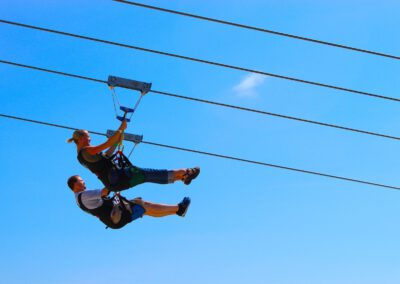 HighFlyer Zipline rider mid-air above Foxwoods Resort Casino, Connecticut