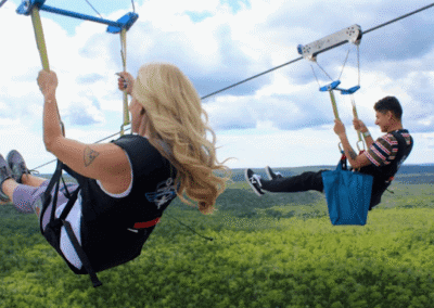 Riders flying side by side on HighFlyer Zipline at Foxwoods Resort Casino, Connecticut